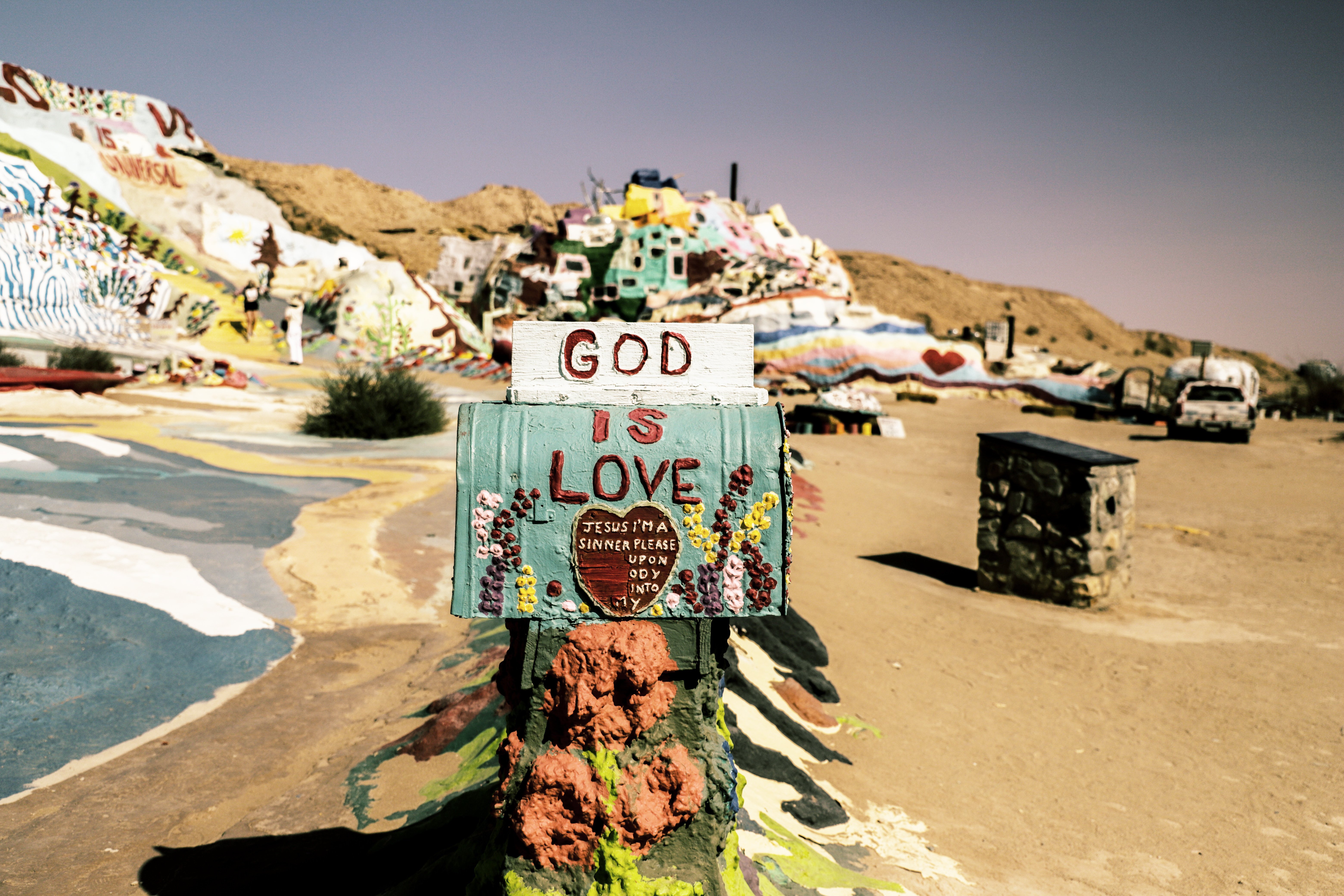 God is love written on a mail box
